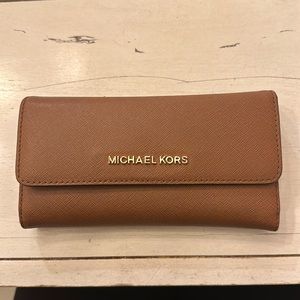 Lightly worn Michael Kors brown tri fold wallet